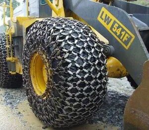 Off-road chain-compatible tyres from AEOLUS with fitted chains navigating extreme rocky terrain