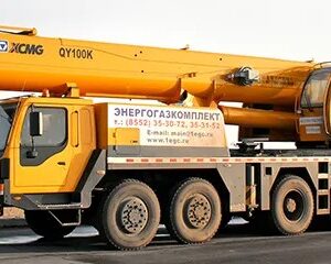 Heavy-duty AEOLUS crane tyres on a mobile all-terrain crane at a construction site